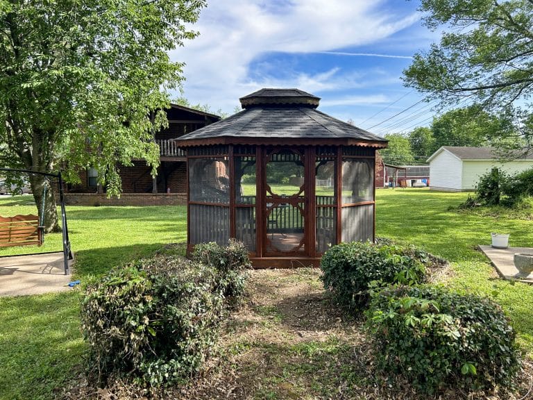 Newly installed shingles on a quaint little gazebo